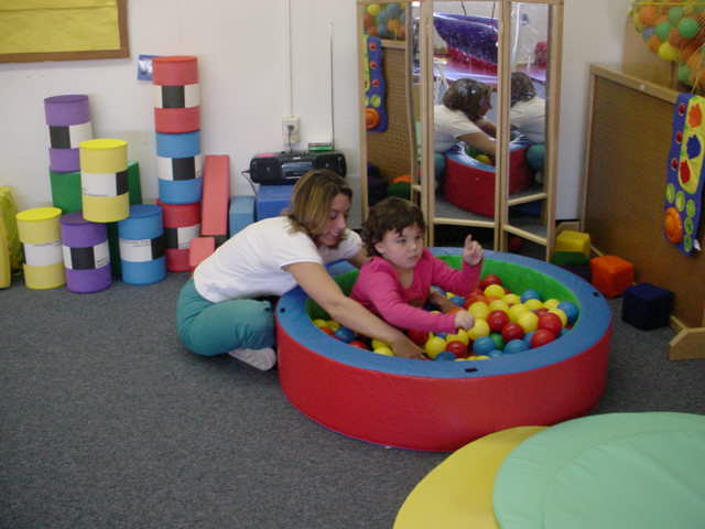 Girl in ball pit